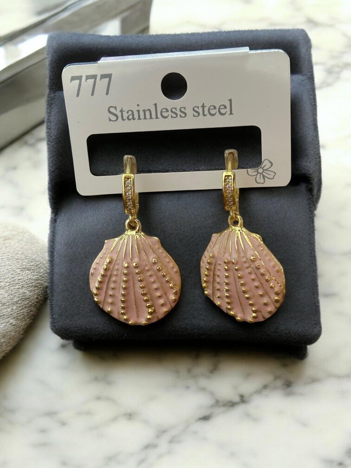 Huggie conchas de mar, acero inoxidable