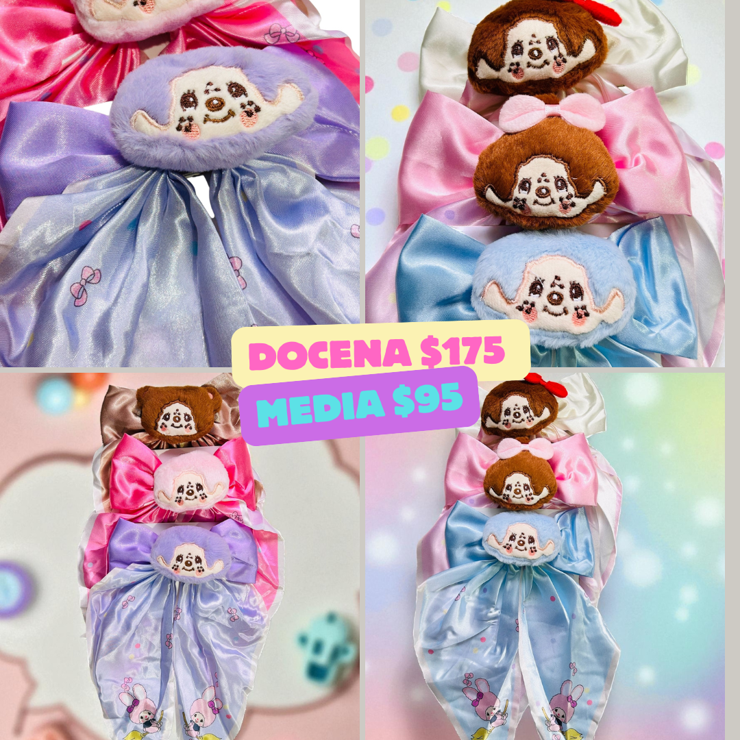 Moño con diseño de muñequita, codigo a241