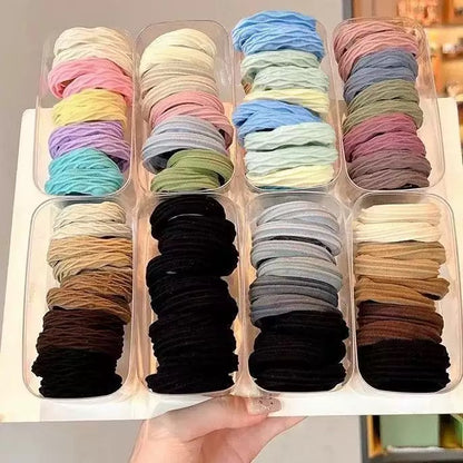 ligas de colores,  en caja de acrilico transparente, codigo XX21