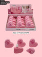 caja con 12 fijadores de maquillaje de corazon, codigo b5612
