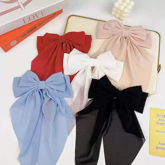 Moño liso de colores variados, tela ligeramente brillosa, codigo a306bis