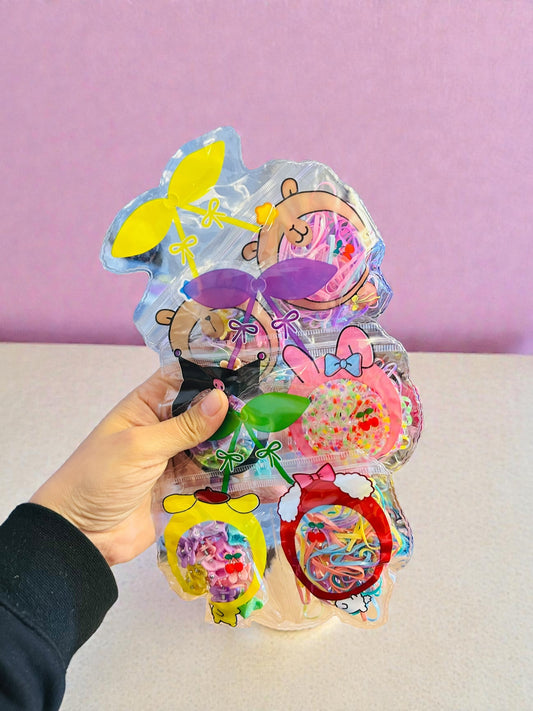 Bolsita de ligas latex con mini pinzas, codigo a136