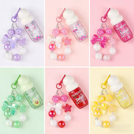 set de 4 gloss con llavero codigo a208