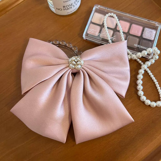 moño conflor de perla en medio, codigo a40